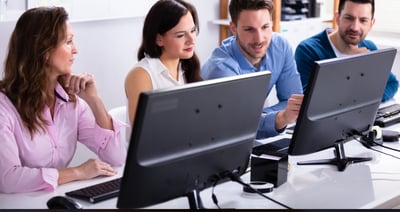 Team is looking at a computer talking about a Migration to Jira Service Management 
